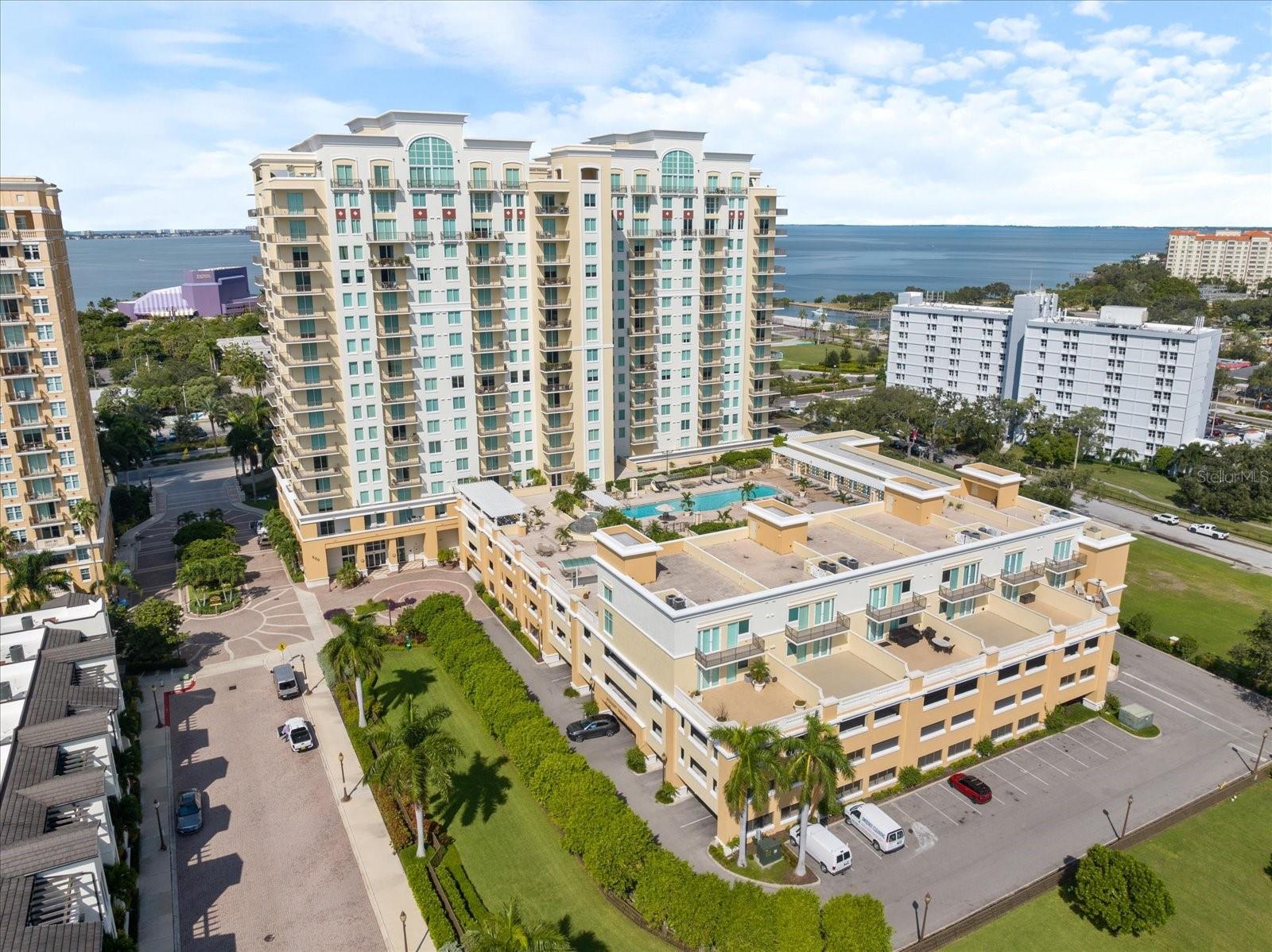 Experience elevated urban living in this furnished 2-bedroom, 2-bath condo located in the luxurious Alinari, at the heart of Sarasota’s vibrant Rosemary District. This spacious residence overlooks a lush, resort-style tropical pool from the private terrace.
Step inside to a tastefully designed interior featuring an open floor plan, living room/dining room/kitchen combination. The kitchen has solid stone counter tops, a closet pantry, stainless steel appliances, an abundance of cabinet and counter space and breakfast bar. The primary bedroom has a king-sized bed, large walk-in closet, on suite bathroom with double sinks, garden tub and a stall shower. The second bedroom has a queen bed, desk, walk-in closet and access to a full bath with stall shower. Living at Alinari means enjoying a resort-like atmosphere with unmatched amenities: a heated pool and spa, state-of-the-art fitness center, sauna, theater, billiard and card rooms, clubroom with catering kitchen, conference rooms, library, wine cellar, EV charging stations, and even guest suites. Enjoy the convenience of 24-hour concierge service, reserved garage parking, and on-site storage.
Just steps from Sarasota’s top cultural venues—including the Van Wezel Performing Arts Hall, The Bay Park, and the Players Theatre—you’ll also find a Publix supermarket less than a block away. Downtown Sarasota’s shopping, dining, and waterfront attractions are all within walking distance, while St. Armands Circle and Lido Beach are just a short trolley ride away.
Don’t miss this rare opportunity to own a slice of paradise in one of Sarasota’s most desirable addresses.