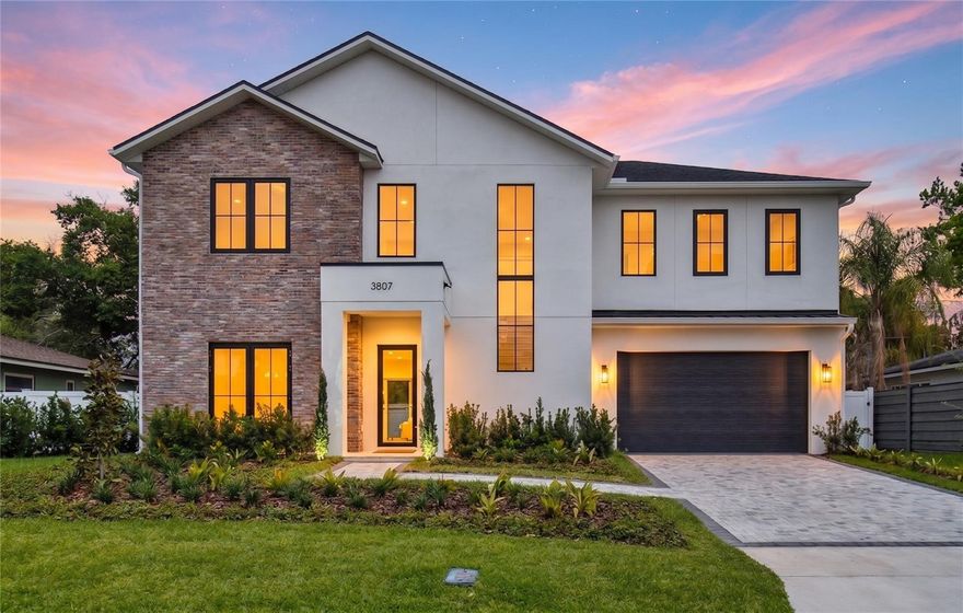 Experience a brand-new pool home in the heart of Audubon Park by renowned builder LUIH Homes. Offering 5 bedrooms, 4.5 bathrooms, and over 3,300 square feet, this home was thoughtfully designed for modern living with spacious gathering areas, practical storage, and high-end finishes throughout.
The open-concept floor plan is anchored by soaring ceilings, a dramatic great room, and a chef’s kitchen with custom finishes, premium appliances, and an oversized island built for entertaining. A separate wet bar mirrors the kitchen’s elevated design and adds even more flexibility for hosting.
The first-floor primary suite creates a true retreat with a spa-inspired bathroom, expansive walk-in closet, and its own washer/dryer hookup inside the closet. Upstairs, a spacious loft provides additional flex space for a media room, office, or playroom, alongside four additional bedrooms. Two feature private ensuite baths, while the other two are connected by a Jack and Jill layout. There is also a full upstairs laundry room, making day-to-day living far more functional for larger households.
Unlike many new construction homes, this property offers a truly usable backyard. The oversized lot features a resort-style pool, covered lanai, outdoor kitchen, and still leaves plenty of green space to play, entertain, or expand.
Located just minutes from Corrine Drive, East End Market, Baldwin Park, Winter Park, and Downtown Orlando, this home places you in the center of one of Orlando’s most loved lifestyle districts. Walk to local coffee shops, restaurants, parks, and neighborhood favorites like Gideon’s Bakehouse while still enjoying the privacy and comfort of a quiet residential street.
Zoned for highly sought-after Audubon Park K-8 and Winter Park High School.
3807 Pelican Lane is a rare combination of modern design, functional layout, and unbeatable location, all in the heart of Audubon Park.