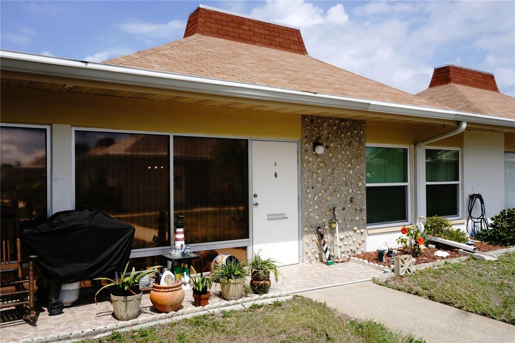 Photo of 4345 Tahitian Gardens Circle #C, Holiday, FL 34691 (MLS # TB8384788)