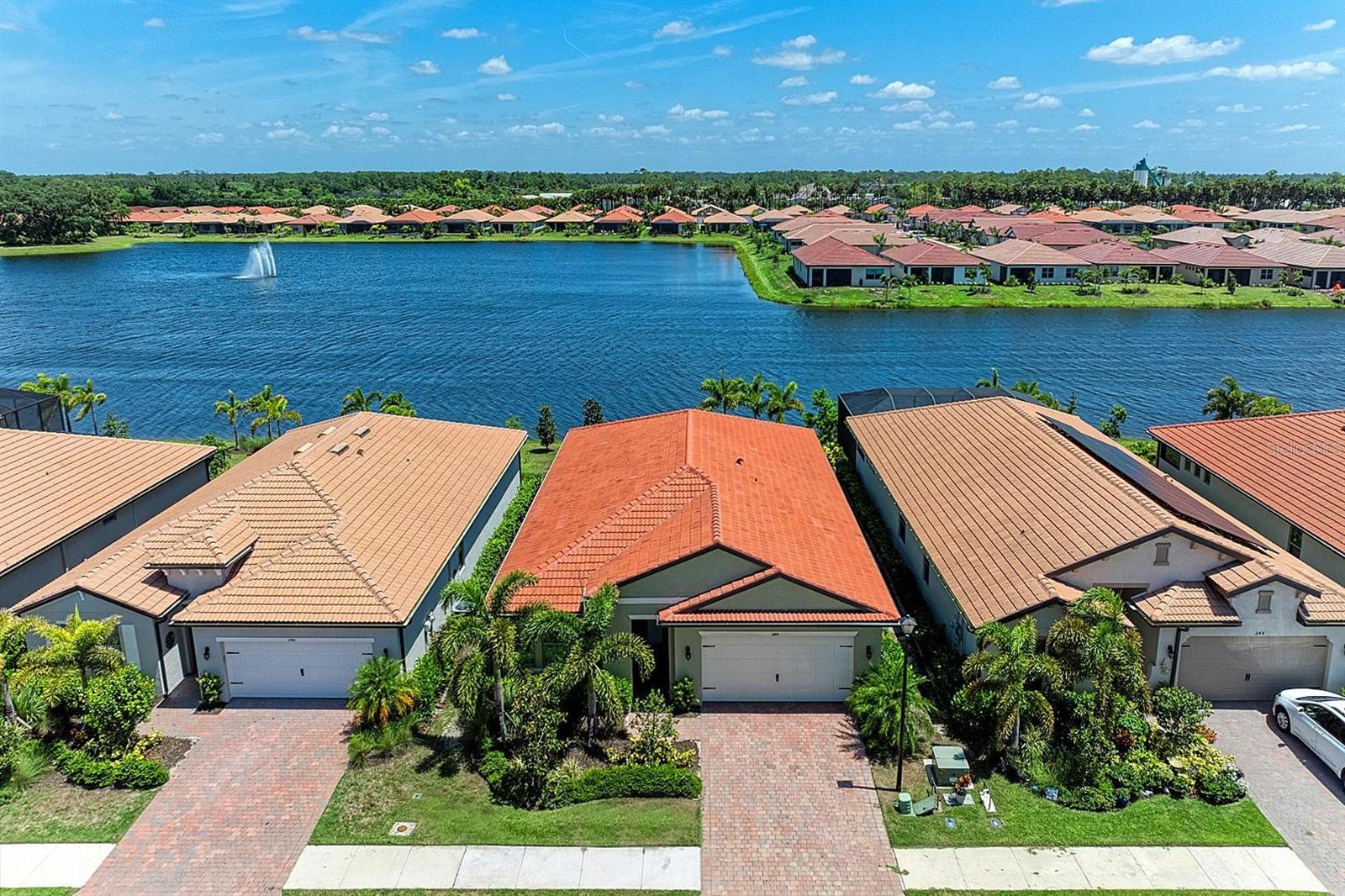 Toscana Isles Unfurnished Rental! Available for Annual or minimum 7-month lease starting August 15th, 2025. Enjoy lakefront living in this almost new luxury home in resort-like, gated Toscana Isles. This gorgeous 3BR, 2.5 bathroom home with an extra-deep garage that accommodates a long vehicle or golf cart is located on a premium lakefront home site. The home offers a modern design throughout with beautiful porcelain tile in the main living area, hardwood flooring in the bedrooms (no carpet here), extensive crown molding, tray ceilings, a large and open gourmet kitchen with quartz countertops, shaker style cabinets, upgraded stainless steel appliances and custom walk-in pantry, and a sunlit dining area overlooking the beautiful lake. The spacious master suite offers a king-sized bed, and the master bath offers double vanities, a walk-in shower, and a large walk-in closet that is connected to the laundry room. The split floor plan provides privacy, with the second bedroom located at the front of the home. The third bedroom offers a large walk-in closet and could be used as a bedroom or a study/den, ensuring privacy for all residents. Toscana Isles is a beautiful, gated community located only 5.8 miles to Casey Key and Nokomis Beach. The resort-style community offers amenities geared toward residents who enjoy an active lifestyle. The Tuscan-designed amenity center provides over 8,000 square feet of space, featuring a lakefront activities room, a catering kitchen, a billiards room with a bar and TVs, a state-of-the-art fitness center, a resort-style infinity-edge pool, and tennis and bocce courts. With over 200 acres of lakes, residents can kayak, canoe, and fish. The community is within a short drive to beautiful downtown Venice and Sarasota, gourmet restaurants, prime shopping, the Legacy Trail, and the new Sarasota Memorial Hospital Venice Campus. Agent-owner. Call today for a showing!