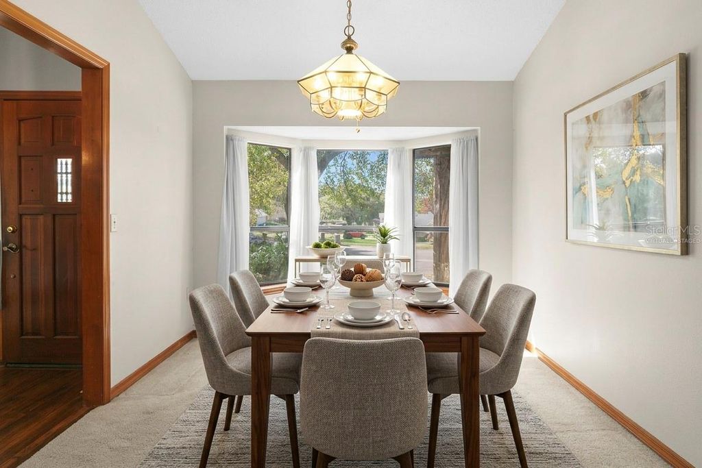 Photo of 973 Red Dandy Drive, Orlando, FL 32818 (MLS # O6388123)