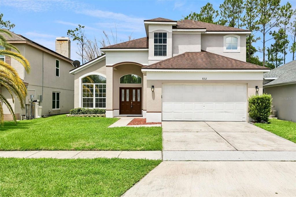 Photo of 832 Magnolia Creek Circle, Orlando, FL 32828 (MLS # O6422703)