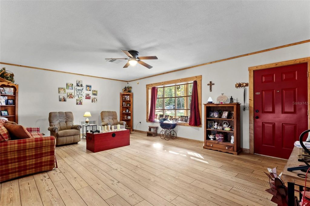 Photo of 8028 Redbud Lane, Brooksville, FL 34601 (MLS # TB8452590)