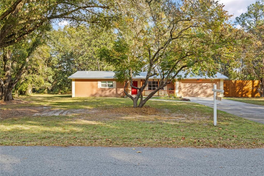 Photo of 8028 Redbud Lane, Brooksville, FL 34601 (MLS # TB8452590)