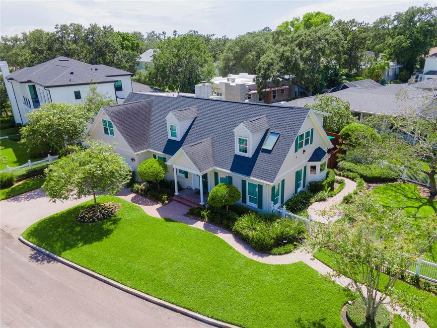 Nestled in the South Tampa neighborhood of Palma Ceia this exquisite home is a true gem. Situated on a tranquil, tree-lined street boasting just nine homes, this property offers privacy and exclusivity that's second to none including picturesque views of the Palma Ceia Golf and Country Club's first hole and second fairway. Boasting a Williamsburg design exterior, this home stands out with its timeless and classic architectural style. The stately façade and meticulous landscaping create an inviting curb appeal, setting the tone for the elegance found within. This spacious 4-bedroom, 3-full bathroom home features two powder rooms for your guests' convenience. As you step through the welcoming foyer, you're greeted by traditional living and dining rooms flanking a graceful staircase. These rooms offer panoramic views of the beautifully landscaped garden and the manicured golf course beyond, providing a sense of tranquility and serenity. The heart of this home is its updated kitchen, where custom cabinets and state-of-the-art appliances meet modern conveniences. Whether you're a seasoned chef or simply love to entertain, this kitchen will delight you with its functionality and style. For those who enjoy hosting gatherings, the dedicated bar/game room is a true highlight that overlooks the open patio, pool, and spa, it's the perfect setting for evening soirees and weekend get-togethers that can spill over to the fabulous, covered lanai. Upstairs, the bedrooms offer versatility for various uses, including a home office for those who work remotely. The master bedroom is a true retreat, featuring vaulted ceilings, a custom walk-in closet and a private sitting room.  This South Tampa home offers the perfect blend of traditional charm and modern amenities. With its ideal location in the coveted Palma Ceia neighborhood and the allure of golf course living, this property is a rare find that embodies the epitome of Tampa living at its finest. Located conveniently to Bayshore Boulevard, Downtown Tampa, International Mall, Tampa International Airport, local shopping and dining venues as well as the bay bridges to the Gulf beaches and 1 ½ hour to Disney.