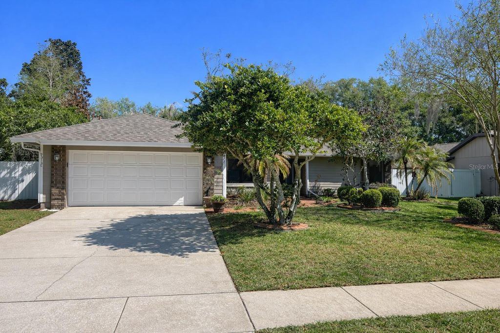 Photo of 9313 Palm Tree Drive, Windermere, FL 34786 (MLS # O6394430)
