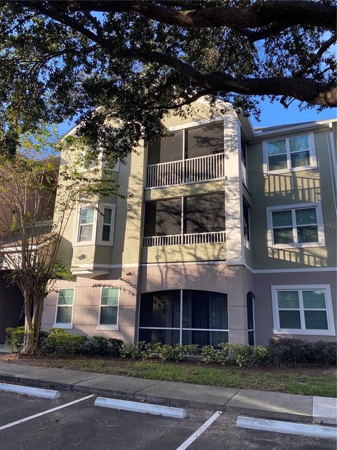 Photo of 6685 Queens Borough Avenue #207, Orlando, FL 32835 (MLS # O6360401)