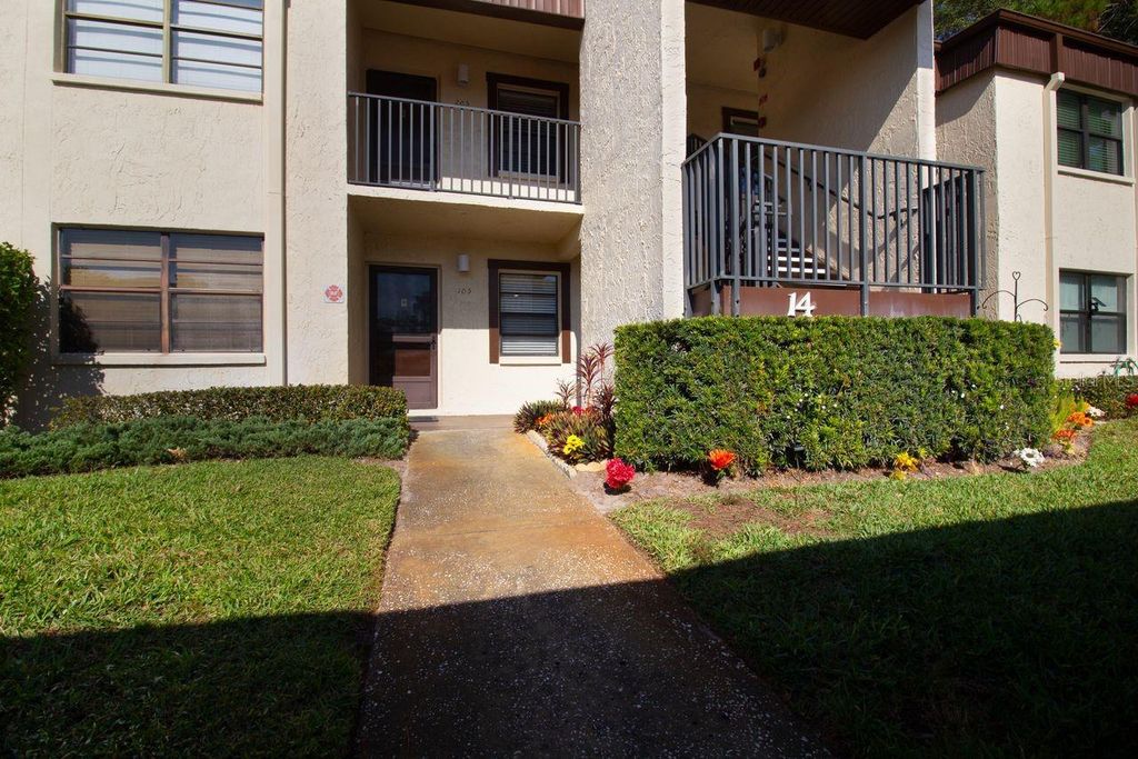 Photo of 2400 Winding Creek Boulevard #14-105, Clearwater, FL 33761 (MLS # TB8450110)