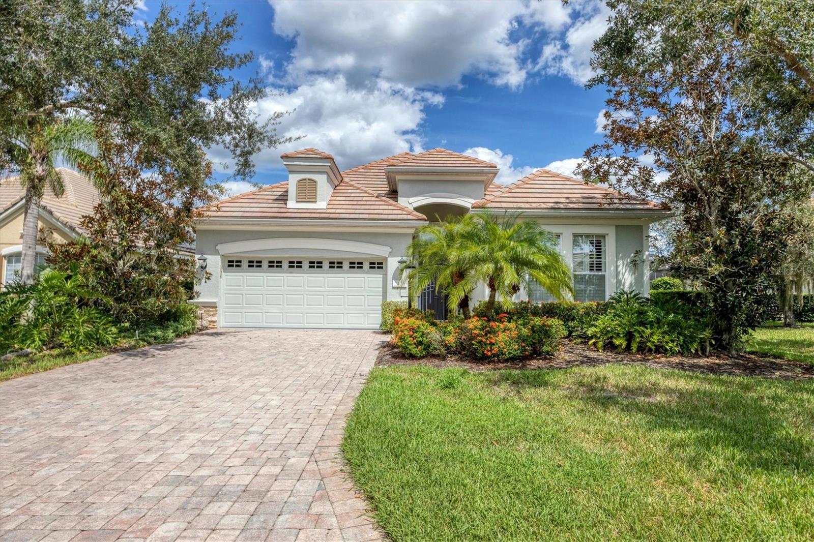 Lakewood Ranch Country Club Village Pool Home, available NOW for a 12 month or longer lease. You will love the understated elegance and warmth of this 2 bedroom plus a den, 2 bath pool home. As you enter this custom home through the wrought iron gate, you will know this is not your typical rental, this is a home who's owner curated delightful accessories, comfortable and tasteful furnishings and artwork exclusively for the home. The spacious primary suite offers a Queen bed with tray ceilings and a HUGE walk-in closet. The Primary bath has a soaking tub as well as a shower and dual sinks. The guest bedroom offers a Queen bed and is situated away from the main living area for privacy. There is a formal dining area, as well as eating space in the kitchen, where you will find a gas range, stainless appliances, wood cabinerty and a breakfast bar. The living area offers comfortable seating and overlooks the paver deck and sparkling pool and spa, just beyond are peaceful lake views. This home is pet-friendly with owner approval, there is also a heated community pool just a few steps away. This gated enclave is just off University Parkway and a little over a mile to the vibrant downtown Lakewood Ranch center, as well as the new UTC shopping Mall and many fine independantly owned shops and 5 star restaurants. Welcome to your own slice of Paradise!