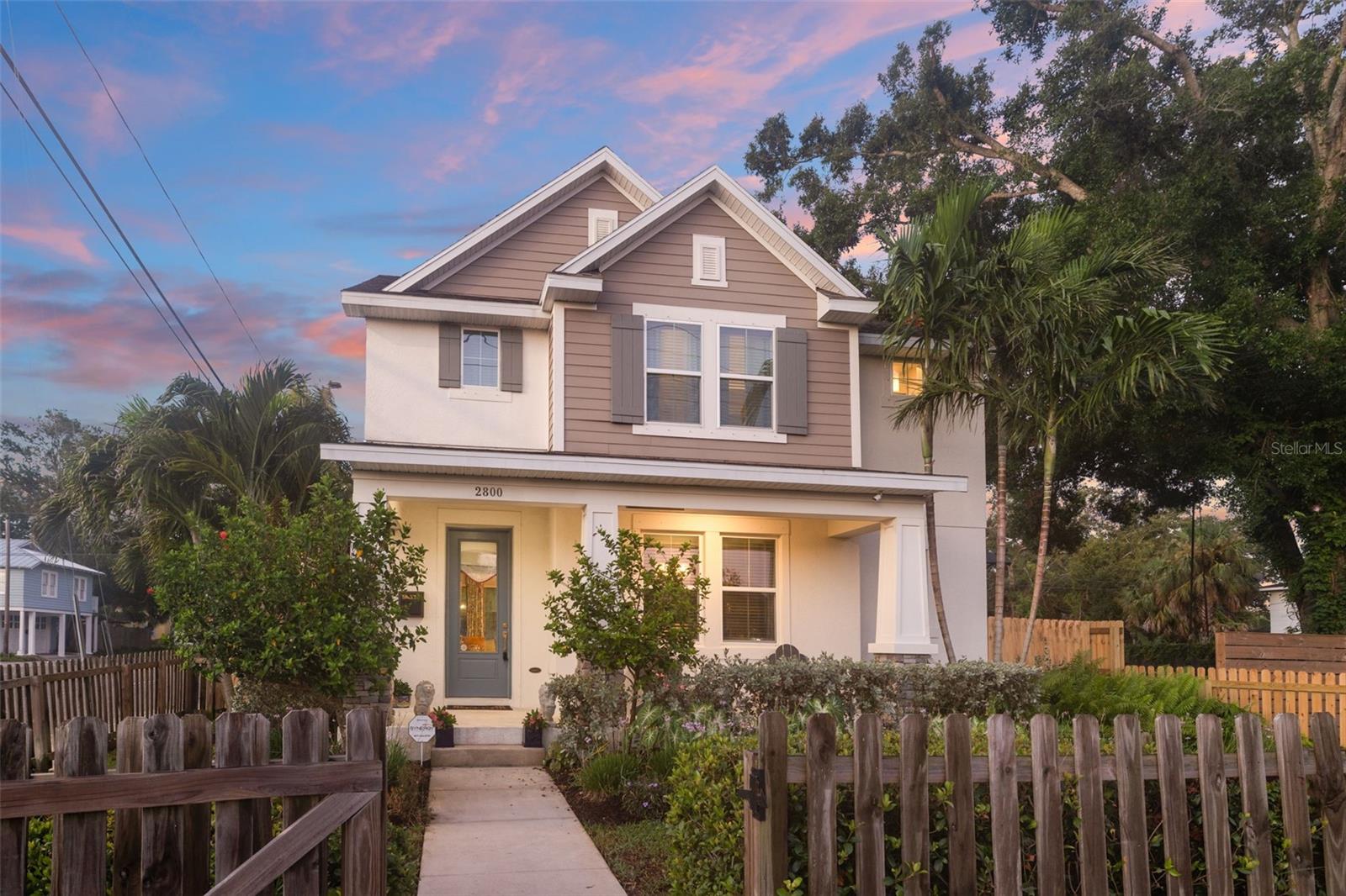 Welcome to 2800 2nd Ave S, a completely customized like new David Weekley masterpiece in the heart of the highly desirable sought-after Palmetto Park neighborhood—just steps away from the Grand Central District and Warehouse Arts District. Built in 2019, this block construction, non-flood zone home boasts 3 bedroom + a loft + a den, 2.5 bathrooms, a 2 car garage with epoxy flooring, and a state of the art swim spa. The chef’s kitchen impresses with seamless quartzite counters and backsplash, updated cabinetry, a Ruvati brass sink, and a full suite of Café appliances, including a double oven and dry bar. A walk-in pantry and custom under-stair storage systems add to the thoughtful layout. Some stunning updates of the home include custom accent walls, upgraded luxury lighting, and designer outlet switches for a tailored aesthetic. Enjoy the Florida lifestyle year-round in your private backyard oasis featuring a heated & chilled swim spa, lush tropical palms, new landscaping with drip irrigation, and paver decking. For the buyer looking for peace of mind, the property includes hurricane shutters, a Rainbird irrigation, an ADT whole house security system, a Honeywell Smart Home thermostat, a Home Team in-wall pest control, and Sentricon subterranean termite protection. Located on a prime corner lot, this home offers walkability, security, and standout design—perfect for the discerning buyer seeking luxury, comfort, and proximity to downtown St. Pete. Can be sold fully furnished for the buyer looking for a turn-key home! Call today for your private showing!
