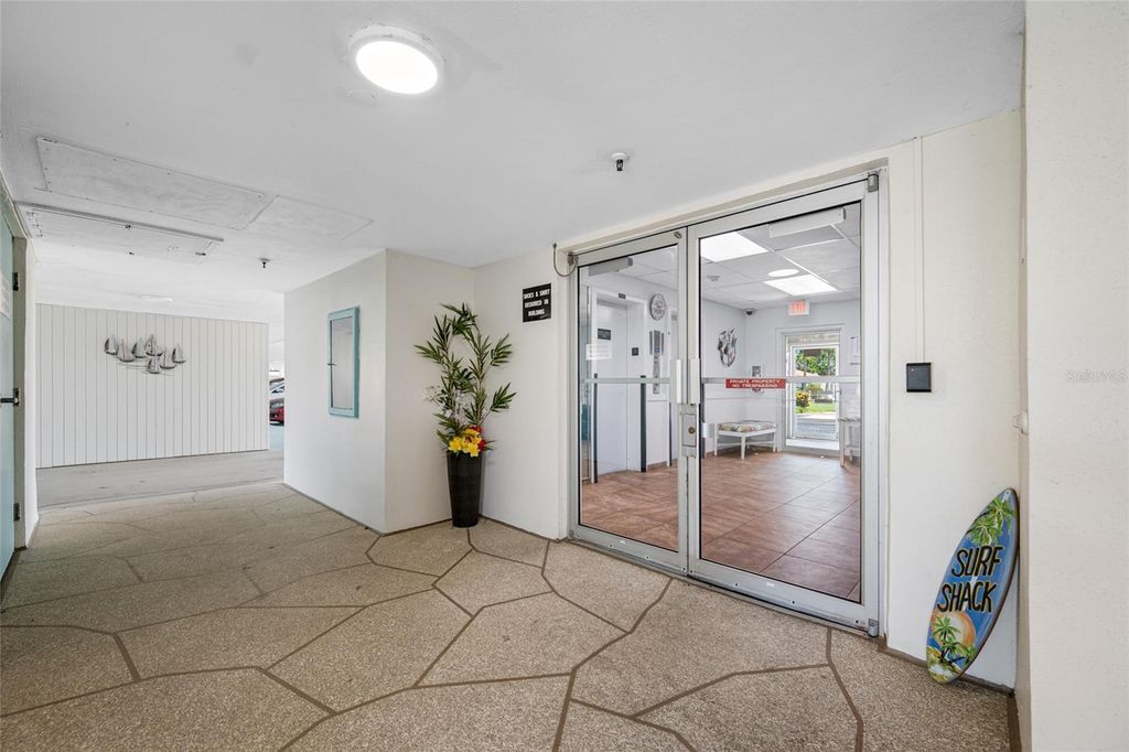 Photo of 10216 Regal Drive #208, Largo, FL 33774 (MLS # TB8386243)