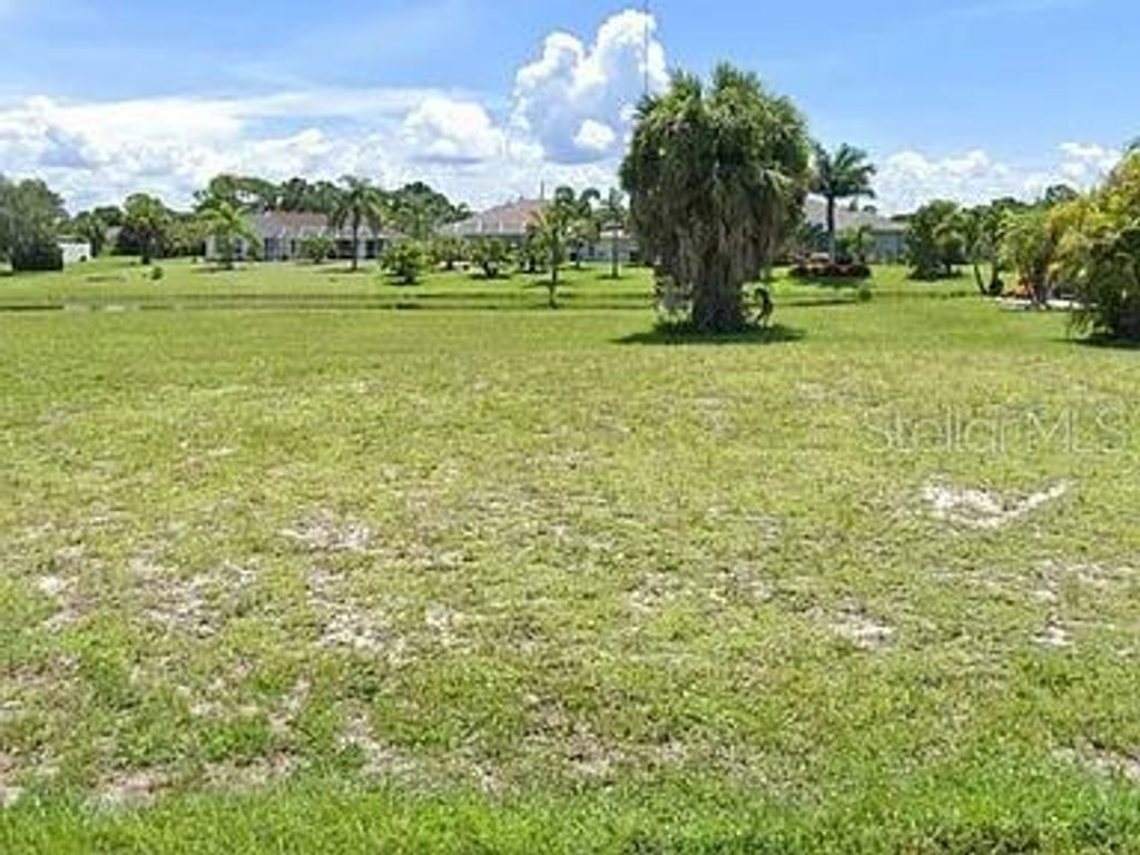 Photo of 841 Rotonda Circle, Rotonda West, FL 33947 (MLS # A4660760)