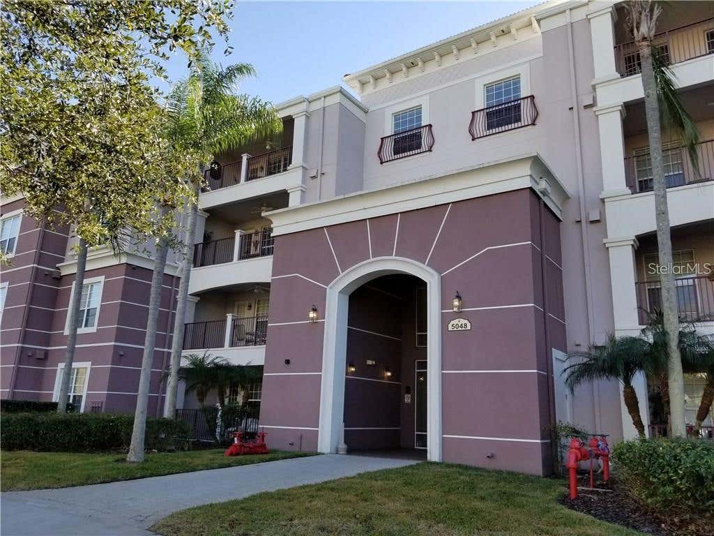 Photo of 5048 Shoreway Loop #20404, Orlando, FL 32819 (MLS # O6429848)