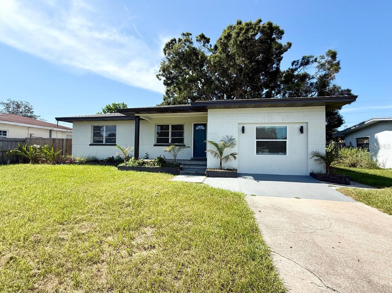 Don't miss this opportunity to rent a beautifully renovated 3-bedroom, 2-bath home located just minutes from Clearwater Beach, with highly rated A-B schools. Step onto the charming front porch with newer brick pavers and updated landscaping that creates a warm welcome. Inside, the newer painted interior features a functional layout with defined living and dining areas, while keeping the spacious kitchen tucked out of view from the front entry. The oversized kitchen is a true standout fully updated with newer cabinetry, quartz countertops, modern fixtures, and stainless-steel appliances. The split floorplan provides privacy, with a generous owners suite featuring a walk-in closet, and two additional bedrooms located on the opposite side of the home. Both bathrooms have been beautifully remodeled with new vanities, tile, lighting, and fixtures. Beautiful laminate wood flooring throughout the home. Perfectly located near shopping, parks, dining, and the world-renowned white sand beaches of Clearwater, this move-in-ready home is ideal for those looking to enjoy all the area has to offer. In addition to the advertised base rent, all residents are enrolled in the Resident Benefits Package (RBP) for $50.00/month which includes HVAC air filter delivery, credit building to help boost your credit score with timely rent payments, utility concierge service making utility connection a breeze during your move-in, and much more! More details upon application. Pets welcome! Vacant and Available now!