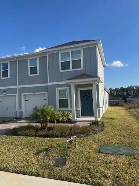 Photo of 1210 Port Blue Way, Lady Lake, FL 32159 (MLS # O6386853)