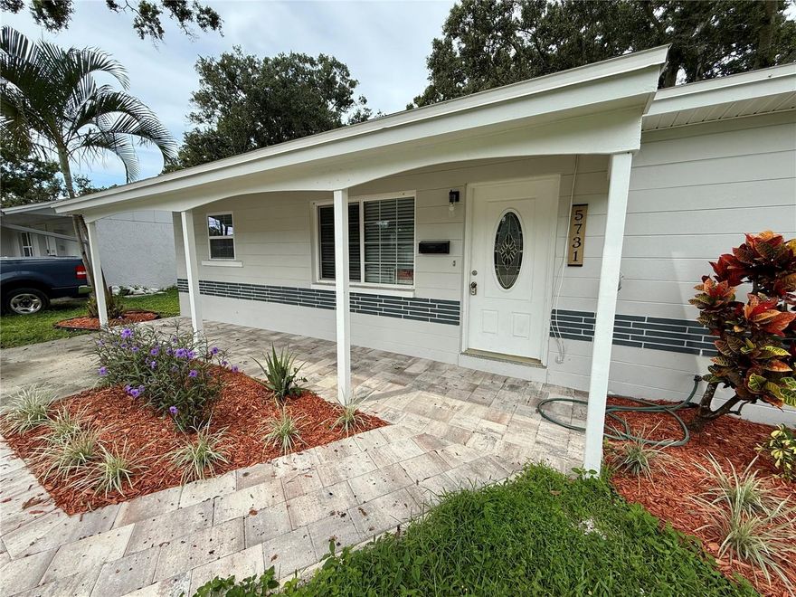 Welcome to this lovely well-maintained single-family block home featuring 3 bedrooms, 1 bathroom, and a flexible bonus room perfect for an office, dining area, playroom, or guest space. Step inside to find a welcoming living room that flows seamlessly into the stunning, fully renovated kitchen—complete with all-new cabinetry, granite countertops, and stainless steel appliances.

Beautiful original terrazzo floors run throughout, adding character and easy maintenance. The home also features an indoor laundry room for added convenience. Outside, enjoy a generous backyard with mature trees and a large shed equipped with electricity—ideal to transform into a workshop, storage, or creative studio. The property sits on a quiet street and has a newer roof (2021). It also held up exceptionally well during last year's storms, with only minimal water intrusion reported.

This move-in-ready home offers the perfect blend of charm, functionality, and thoughtful updates—don’t miss your chance to make it yours!