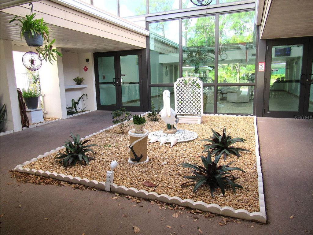 Photo of 21260 Brinson Avenue #212, Port Charlotte, FL 33952 (MLS # C7523151)