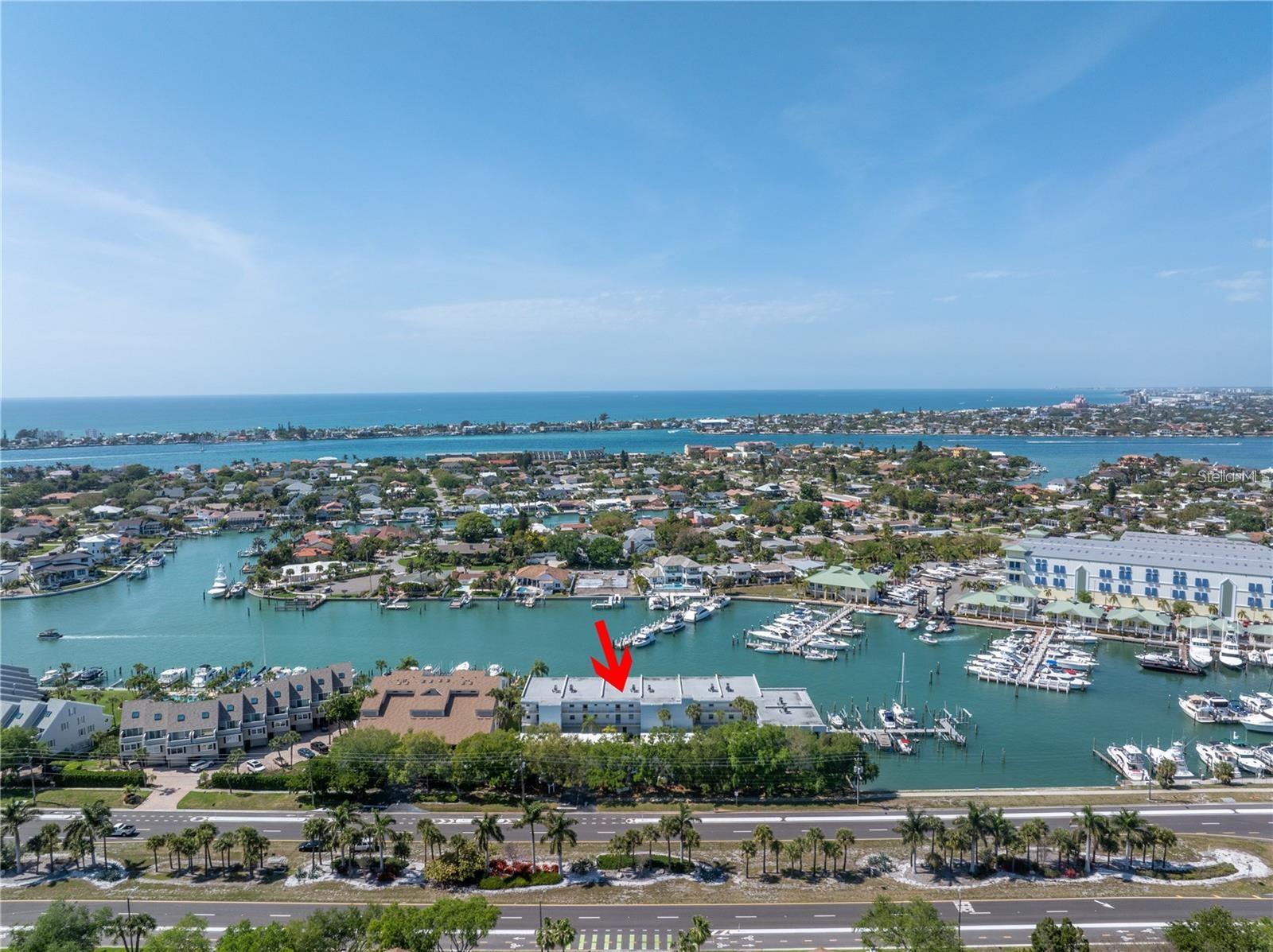 Waterfront condo with a boat slip on the Grand Canal in Tierra Verde! Discover the allure of Gulf Coast living with this beautifully updated top-floor condo. With tasteful upgrades throughout, this residence strikes the perfect balance of style and functionality. A welcoming retreat for those seeking the best of Florida’s waterfront lifestyle.
Step inside to a thoughtfully remodeled kitchen that seamlessly flows into the open dining and living areas, creating a warm, connected space ideal for everyday living or entertaining. Crown molding, wide baseboards, and detailed door casings in the living room showcase the craftsmanship and care found throughout the unit. The guest bedroom and bath, along with a discreetly tucked-away laundry room, provide comfort and privacy for guests. A thoughtfully placed pocket door allows you to create a private guest suite when desired. The primary suite located just off the living room features balcony access, a beautifully renovated en-suite bath, and a custom walk-in closet.
Impact sliding doors lead to a full-length balcony overlooking the peaceful Tierra Verde Grand Canal. The perfect place to relax and soak in the view.
One of this property's most sought after features is the approximately 45-foot boat slip directly across from the fueling stations at Port 32 Marina offering quick, direct access to the Gulf. A true boater’s dream!
Additional perks include a large bonus cabana/flex space on the ground level, perfect for storage or waterside entertaining. The open-air deck and screened cabana are perfectly situated in front of the heated pool.
Ideally located just minutes from Fort De Soto Park and the award-winning sands of St. Pete Beach, this condo offers refined coastal living with everyday convenience.