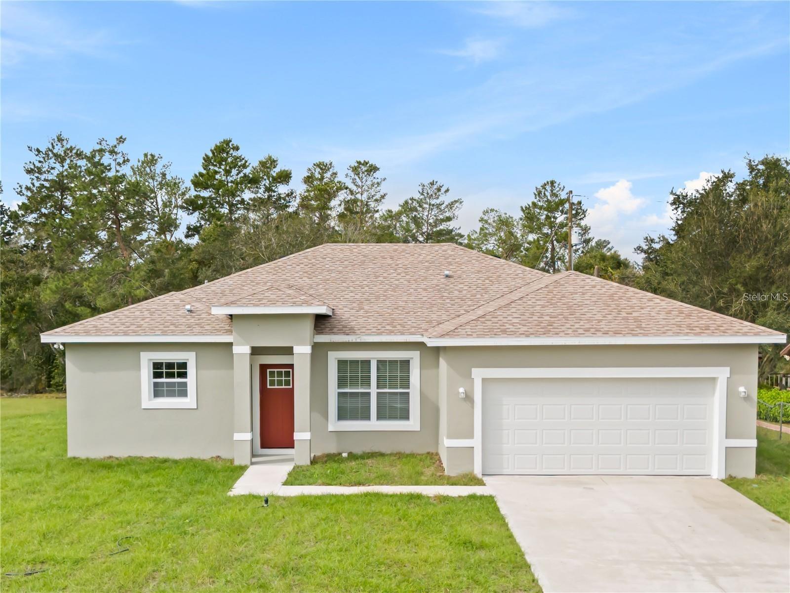 Seller Credits are available!! Step into this BRAND-NEW 2025 HOME in the heart of Ocala, where modern design meets comfort and convenience. Featuring 4 BEDROOMS and 2.5 BATHROOMS, this home is perfect for families or anyone looking for spacious, stylish living. The master suite offers a spa-like retreat with a beautiful STANDALONE TUB and a sleek SHOWER DOOR that adds both elegance and functionality. The open-concept layout is ideal for entertaining, and the chef-style kitchen comes fully equipped with STAINLESS STEEL APPLIANCES including refrigerator, range, dishwasher, microwave, and disposal. Enjoy premium finishes like TOP-OF-THE-LINE BASEBOARDS and STAINLESS STEEL HANDLES throughout, along with a SMART KEY SYSTEM for added security. Outside, you'll find a private backyard with a shaded BACK PATIO, perfect for a future barbecue area. Located in a CENTERED LOCATION with easy access to DISNEY PARKS, DAYTONA BEACH, and local conveniences—just 15 minutes to restaurants, Walmart, Publix, and more. Enjoy nearby recreation with SUMMERGLEN GOLF CLUB just 5 minutes away, STONE CREEK GOLF CLUB and TOP-RATED TRAILS like Hitching Post and Santos Trails within 20 minutes, and the WORLD EQUESTRIAN CENTER just a 30-minute drive. Best of all, this home HAS NO HOA, offering you more freedom and flexibility. This property is a 2-minute drive from Marion Oaks Community Center, which offers no cost access to TENNIS COURTS, BASKETBALL CORTS, PLAYGROUNDS, PUBLIC LIBRARY, and more!!! Don’t miss the opportunity to own this beautifully crafted home in a prime location!