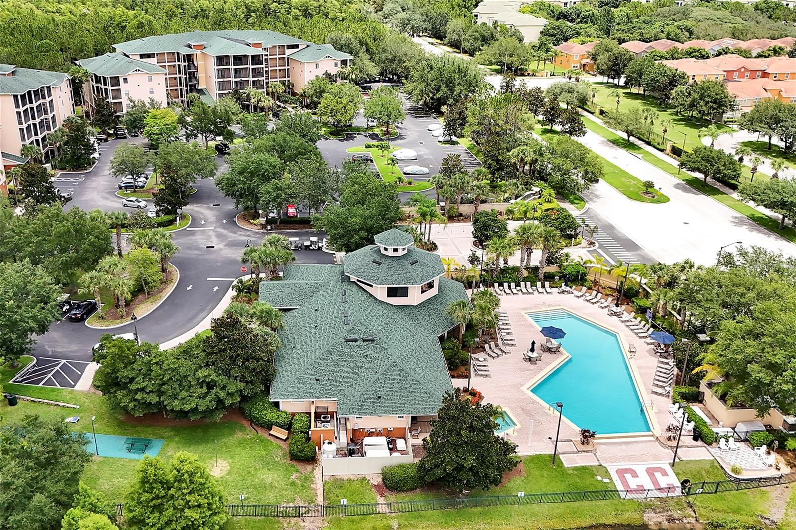 Discover a hidden Disney gem at Caribe Cove! This stunning 2-bedroom, 2-bath condo boasts 1,445 sq ft of living space with serene nature views. Located on the 3rd floor, this remodeled end unit is perfect for families or as a vacation home/investment property. Fully furnished and turnkey, the floorplan offers plenty of room for everyone. The spacious living room opens to a screened lanai overlooking nature, while the central dining room connects to a kitchen filled with cabinet space, stainless steel appliances, and a breakfast bar. The cozy master suite includes its own screened lanai, ideal for a peaceful morning coffee, and an adjoining bathroom with dual vanities, an upgraded walk-in shower, and a garden tub. The Star Wars-themed bedroom has two twin beds, a walk-in closet, and access to the guest bathroom. A laundry room adds convenience. Beautifully decorated with custom paintings, this home feels brand new. Recent updates include a newer AC unit and hot water tank. Caribe Cove is a gated community with fantastic amenities like a clubhouse, pool, spa, fitness center, and more. HOA fees cover community amenities, cable, security, exterior maintenance, trash, and sewer. Conveniently located near attractions, Hwy 192, and US 27 for great shopping and dining options. Virtual tour available—schedule your private tour today!