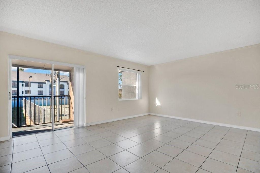 Photo of 2507 N Alafaya Trail #10, Orlando, FL 32826 (MLS # O6394787)