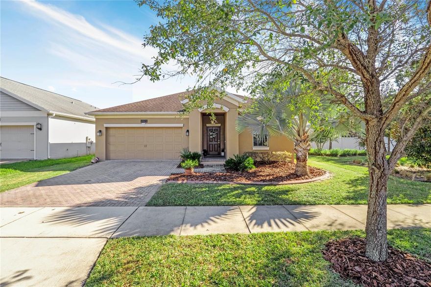 Welcome home to this beautifully updated property offering comfort, style, and an unbeatable Lake Nona-area location. Enjoy a freshly paved driveway, fresh interior and exterior paint, and brand-new luxury vinyl plank flooring that brightens the open, split floor plan. The modern kitchen features granite countertops, stainless steel appliances, and overlooks the main living area—perfect for everyday living and entertaining. A water softener system adds extra convenience. The private primary suite offers an en-suite bath with dual sinks, a soaking tub, and a generous walk-in closet. Step outside to the screened lanai and relax in the backyard retreat, complete with several mature fruit trees that provide shade, seasonal harvests, and a peaceful outdoor setting. Ideally located just minutes from MCO Airport and all that Lake Nona has, including schools, dining, shopping, and entertainment.