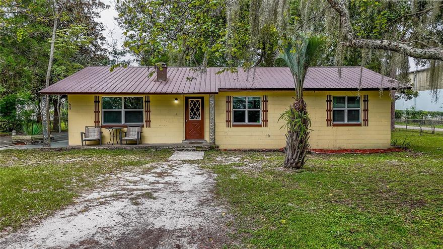 Charming 3 bedroom, 2 bathroom home situated on a quiet corner lot with 0.37 acres and a fully fenced backyard. This property features a durable metal roof, screened-in back porch, and plenty of outdoor space to enjoy. The backyard is home to a resident peacock, adding unique character to the setting. Located on a peaceful street, this home offers both comfort and privacy while still being close to local conveniences.