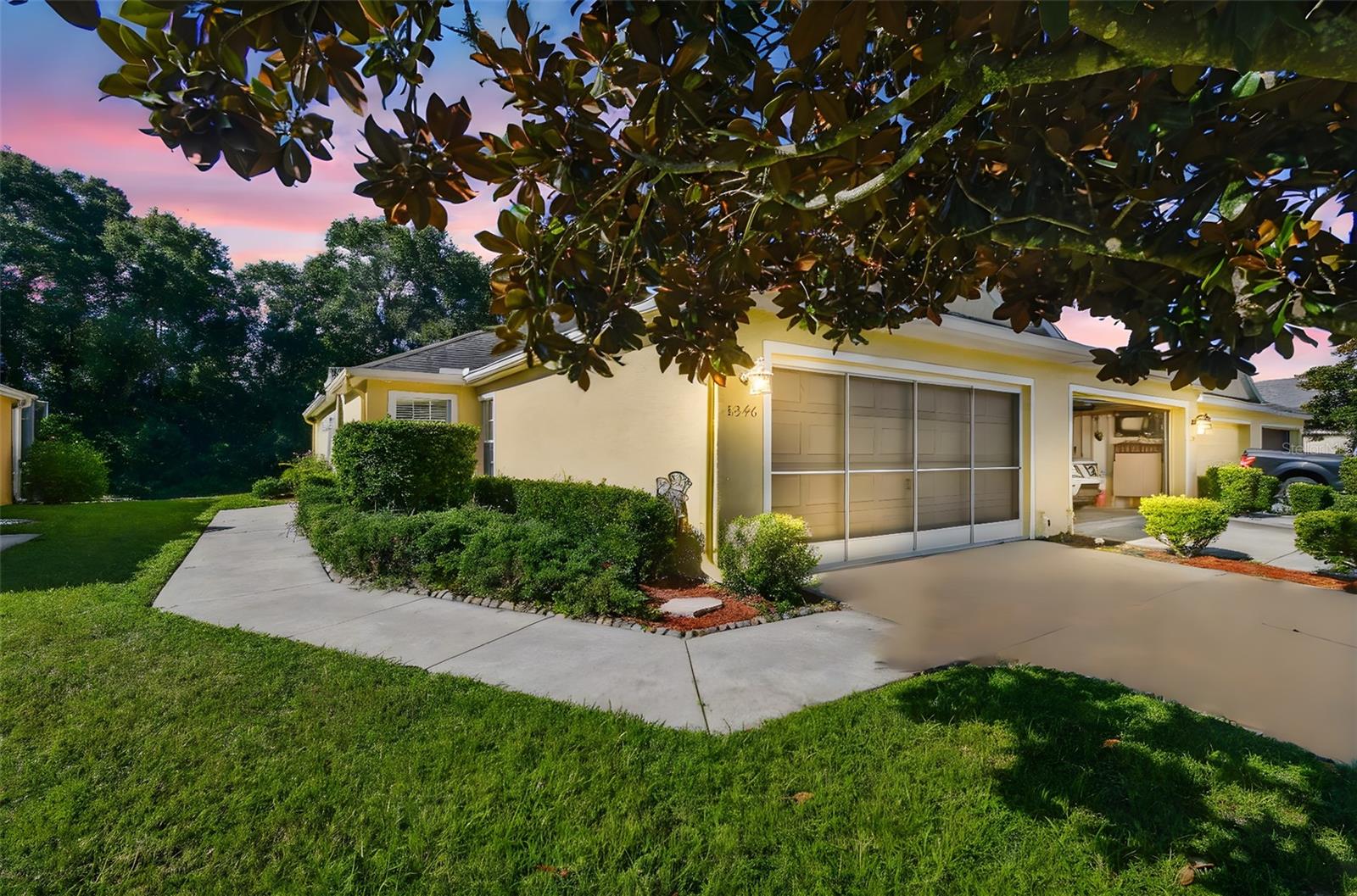 2/2/2 with a BONUS ROOM villa offering 1,138 sq. ft. of modern comfort in the desirable gated community of Lexington Commons. Built in 2012, this end-unit home boasts an open floor plan with high ceilings, ceramic tile and carpet flooring, and upgraded light fixtures throughout. Newly floored common area. The well-appointed kitchen features tall cabinets, a flat-top range, stainless steel microwave, and a convenient breakfast bar, perfect for casual dining. The spacious master suite includes a walk-in closet and an en-suite bathroom, while two additional rooms provide ample space for guests, family, or a home office. Enjoy the convenience of an inside laundry room with washer and dryer hook-up, plus a two-car attached garage. Step outside to your private open porch with serene conservation views, ideal for relaxing or entertaining. The low-maintenance lifestyle is enhanced by the HOA, which covers exterior maintenance, lawn care, pest control, trash service, and gate for only $195/month. Located minutes from Trinity, the new Ridge Road extension, and Veterans Expressway, this home offers easy access to shopping, medical facilities, schools, golf courses, beaches, and downtown New Port Richey’s vibrant scene. This villa combines modern amenities with a prime location. Schedule your private showing today and discover the best of Florida living!