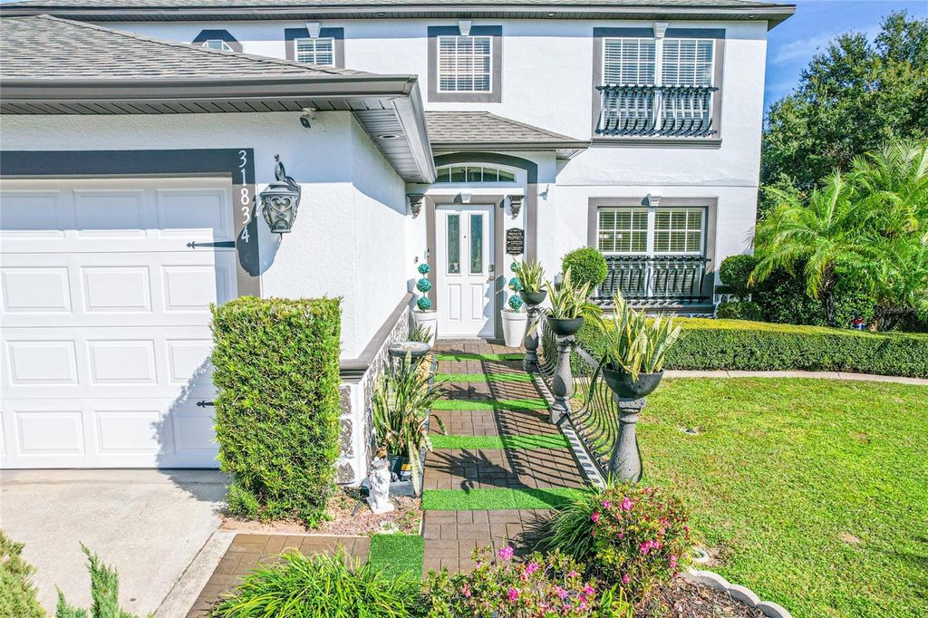 Photo of 31834 Parkdale Dr, Leesburg, FL 34748 (MLS # O6365794)