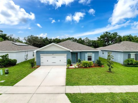 Photo of 408 Button Sage Lane, Davenport, FL 33837 (MLS # O6327891)