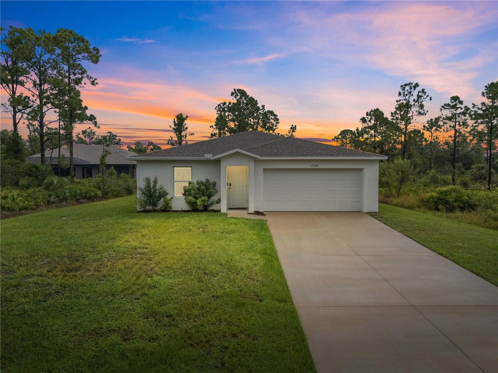 Photo of 13084 Parham Avenue, Port Charlotte, FL 33953 (MLS # C7531840)
