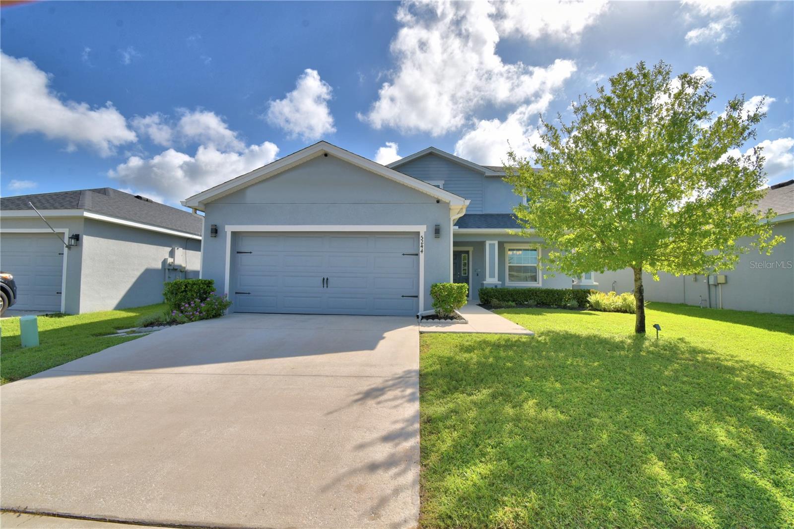 So Much House – Built in 2020! This stunning 5-bedroom, 3.5-bath home with a 2-car garage was built in 2020 and has been meticulously maintained and upgraded, it truly looks like brand new! Perfectly located near Publix, Lakeside Village Mall, restaurants, shopping, and Lakeland Airport, this home offers both convenience and comfort.
Enjoy the world-famous Sun ’n Fun Air Show and other exciting events every year, with the added bonus of no airport noise. Flight schools and aviation academies are also nearby, making this an ideal location for aviation enthusiasts. Get to the airport and back in less than 20 minutes.
?? Highlights You’ll Love:
-Master Suite on the Main Floor – spacious bedroom, custom walk-in closet, upgraded tiled shower, dual-sink vanity, linen closet & private water closet.
-Chef’s Kitchen – quartz countertops, stainless steel appliances, huge pantry, double islands, breakfast bar, deep stainless sink with reverse osmosis water filter, upgraded faucet + matching soap dispenser.
-Whole-House Water Filtration System – clean, filtered water throughout the home.
-Open & Flexible Layout – luxury vinyl plank throughout main living areas & baths, modern lighting, downstairs flex room (dining/office), mudroom with custom shelving, and multiple upstairs loft/bonus areas.
-Cozy Living Room – enjoy the water view while relaxing by the electric fireplace.
-Entertainment Ready – two TVs (upstairs & downstairs) plus an outdoor dining table and BBQ grill that stay with the home.
-Upstairs Bedrooms – two with a Jack & Jill bath (double vanity + tiled tub/shower), plus another full bath with tiled walk-in shower. All bedrooms feature custom closet shelving.
-Outdoor Living – screened lanai with sink & gas grill, fenced backyard, pond views, outdoor shower, and garden boxes in the backyard for growing your favorite plants, vegetables, or flowers.
?? Community Amenities: Two pools, clubhouse, playground, and dog park – plenty of room for family and pets to enjoy.
?? Bonus Features: Upstairs laundry with premium Speed Queen washer/dryer and built in laundry baskets, in the garage dog wash sink + extra washer hookup, and option to purchase furniture & décor. No pets have ever lived here, and this home has been kept spotless.