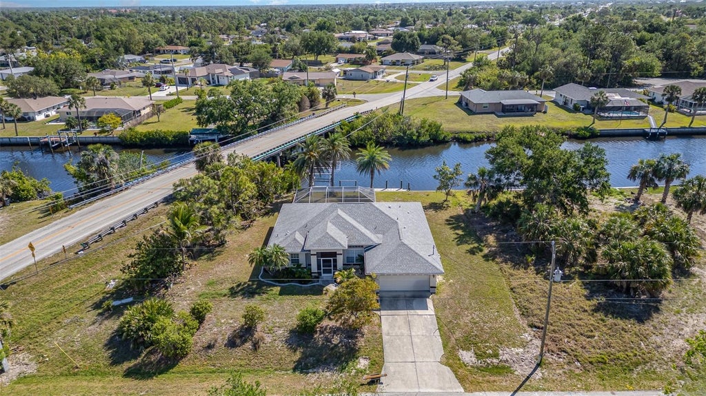 Photo of 4010 Yucatan Circle, Port Charlotte, FL 33948 (MLS # C7530695)