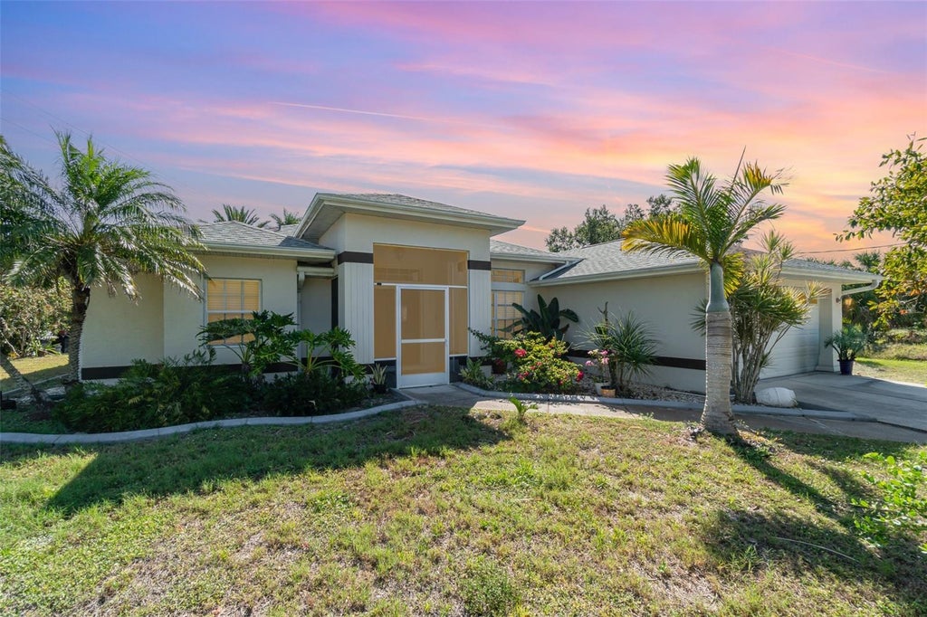 Photo of 4010 Yucatan Circle, Port Charlotte, FL 33948 (MLS # C7530695)