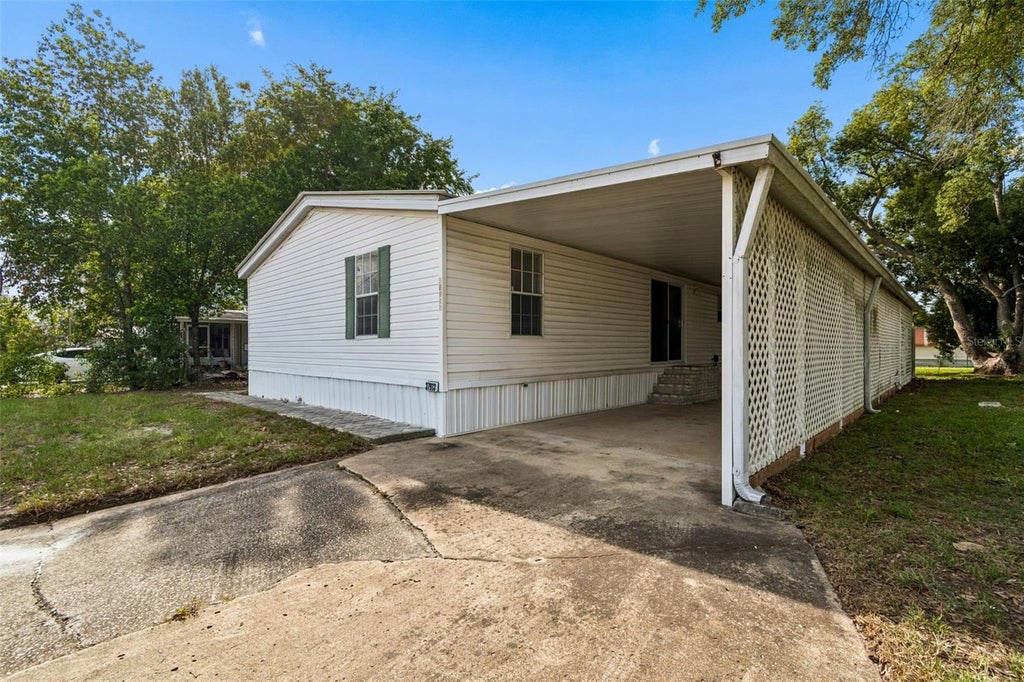 Photo of 37913 Palmetto Palm Drive, Zephyrhills, FL 33542 (MLS # TB8513640)