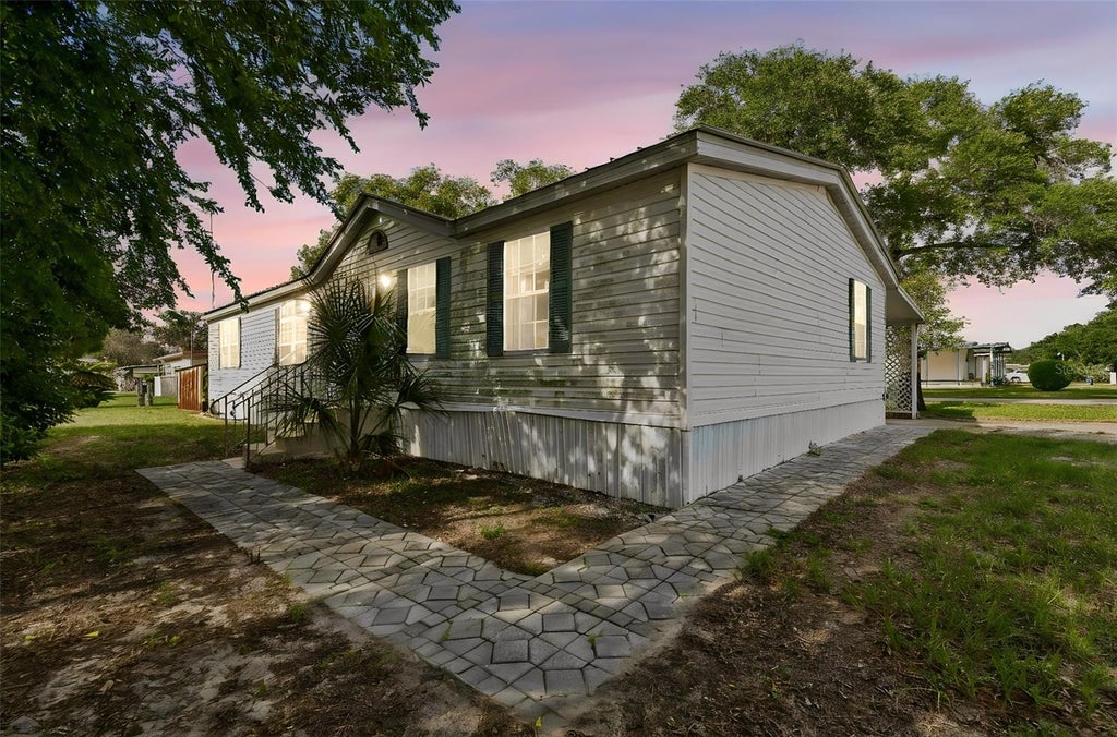 Photo of 37913 Palmetto Palm Drive, Zephyrhills, FL 33542 (MLS # TB8513640)