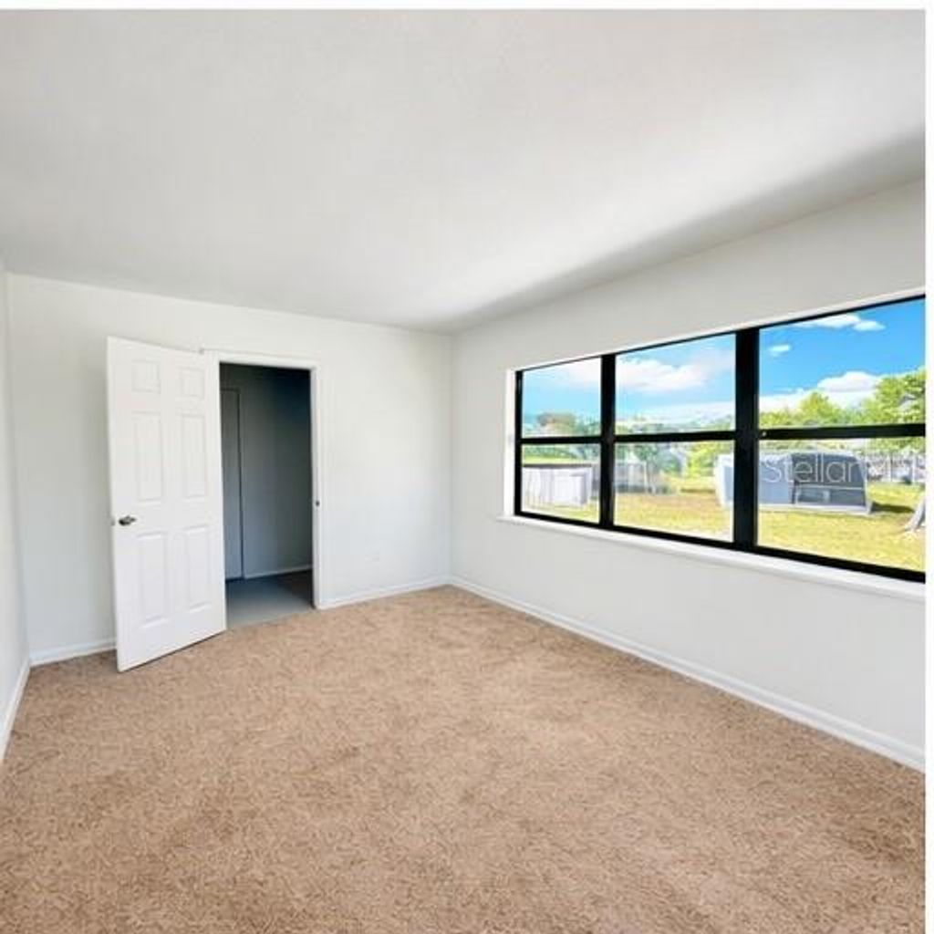 Photo of 645 Dalton Boulevard, Port Charlotte, FL 33952 (MLS # TB8480561)