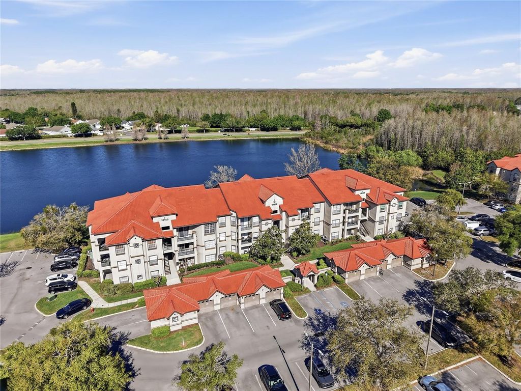 Photo of 18106 Peregrines Perch Place #5104, Lutz, FL 33558 (MLS # TB8490109)
