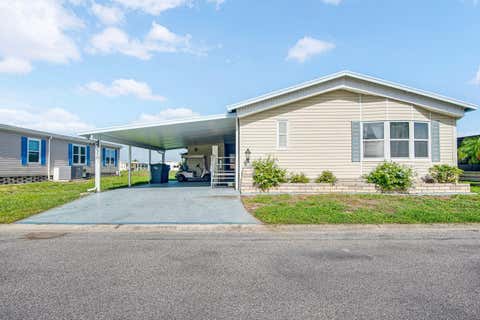 Photo of 9107 34th Avenue E, Palmetto, FL 34221 (MLS # A4700429)