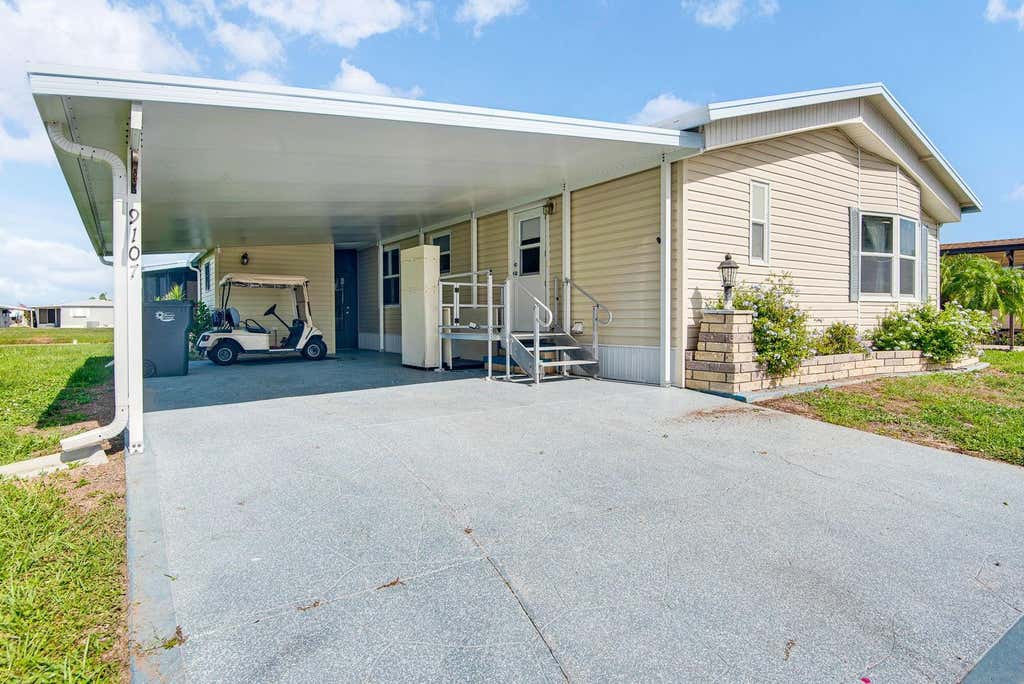 Photo of 9107 34th Avenue E, Palmetto, FL 34221 (MLS # A4700429)