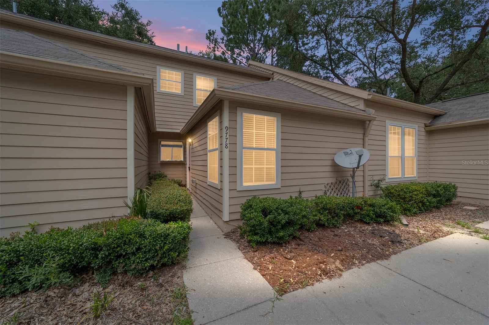 One or more photo(s) has been virtually staged. Welcome to this charming two-story attached home offering comfort, convenience, and a low-maintenance lifestyle in a vibrant, amenity-rich community. With fresh paint and new carpet in the bedrooms, this home is move-in ready and thoughtfully designed with a split floor plan—ideal for privacy—with one bedroom and bath on each level.
The open-concept great room features vaulted ceilings and a skylight that fills the space with natural light, creating an airy and inviting atmosphere. The kitchen flows seamlessly into the dining and living areas, perfect for everyday living or entertaining. A convenient laundry closet comes equipped with a washer and dryer.
Step outside to your own private, fenced yard with an open patio—perfect for relaxing, grilling, or enjoying a morning cup of coffee.
Located just a short stroll from the Village Center, you’ll enjoy access to a weekly farmers market, shops, restaurants, professional services, and miles of scenic paved trails. Families will appreciate proximity to highly rated schools, while active lifestyle seekers will love being around the corner from Hawkstone Country Club, which offers golf, tennis, pickleball, swimming, a fitness center, and two sparkling pools.
This is more than just a home—it’s a lifestyle!