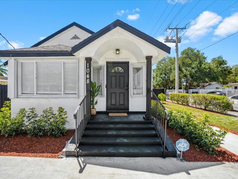 1048 NW 33RD AVENUE MIAMI FL 33125