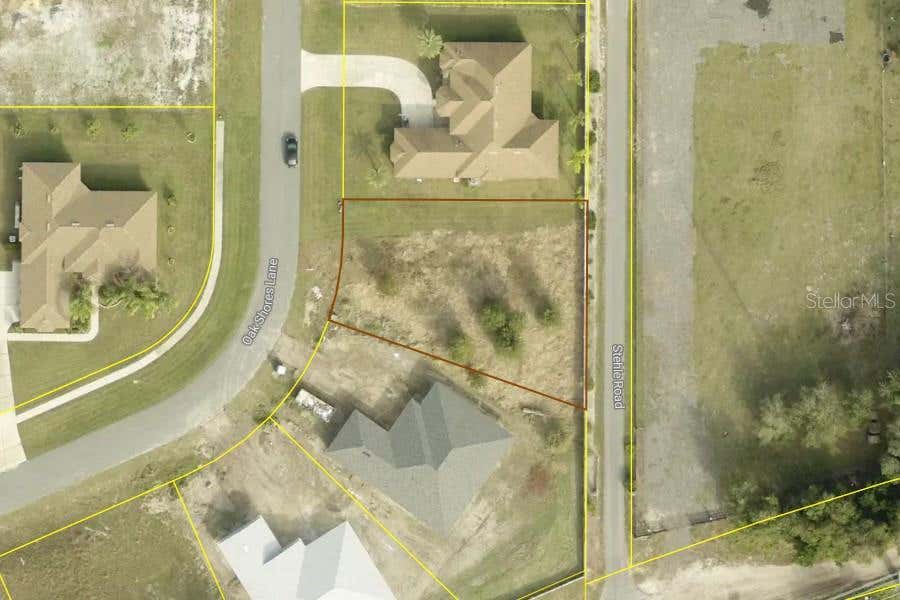 Photo of 817 Oaks Shores Road, Leesburg, FL 34748 (MLS # O6432051)