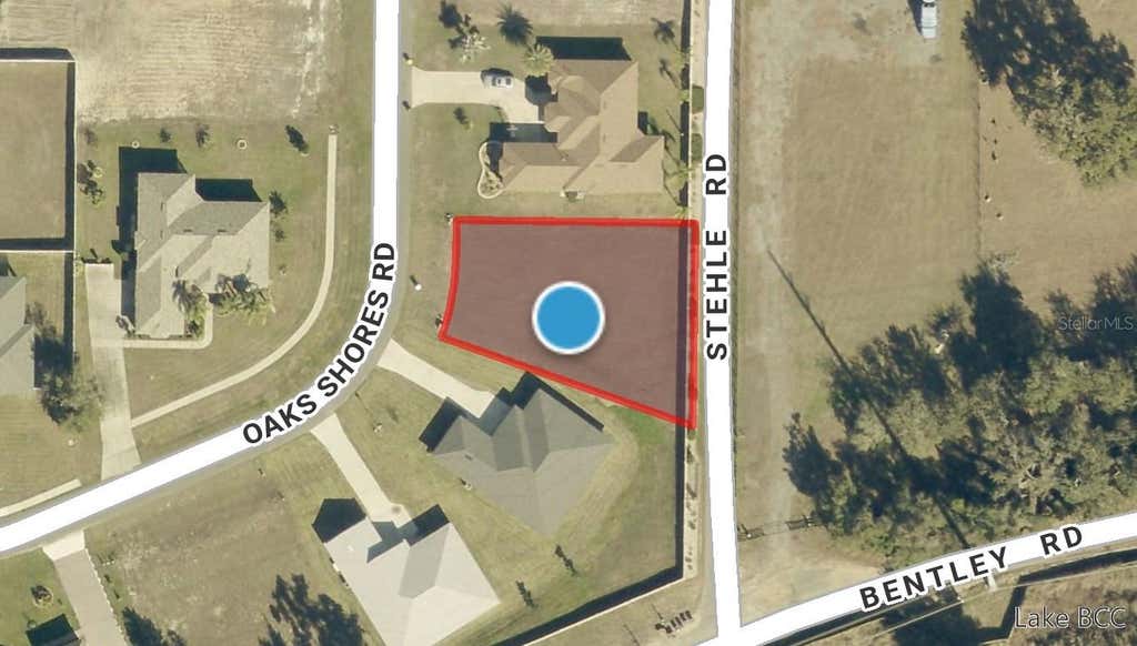 Photo of 817 Oaks Shores Road, Leesburg, FL 34748 (MLS # O6432051)