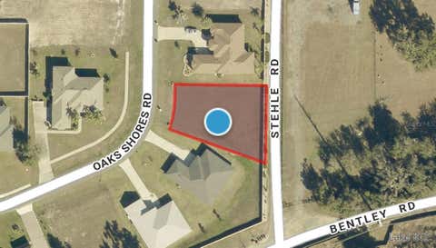 Photo of 817 Oaks Shores Road, Leesburg, FL 34748 (MLS # O6432051)