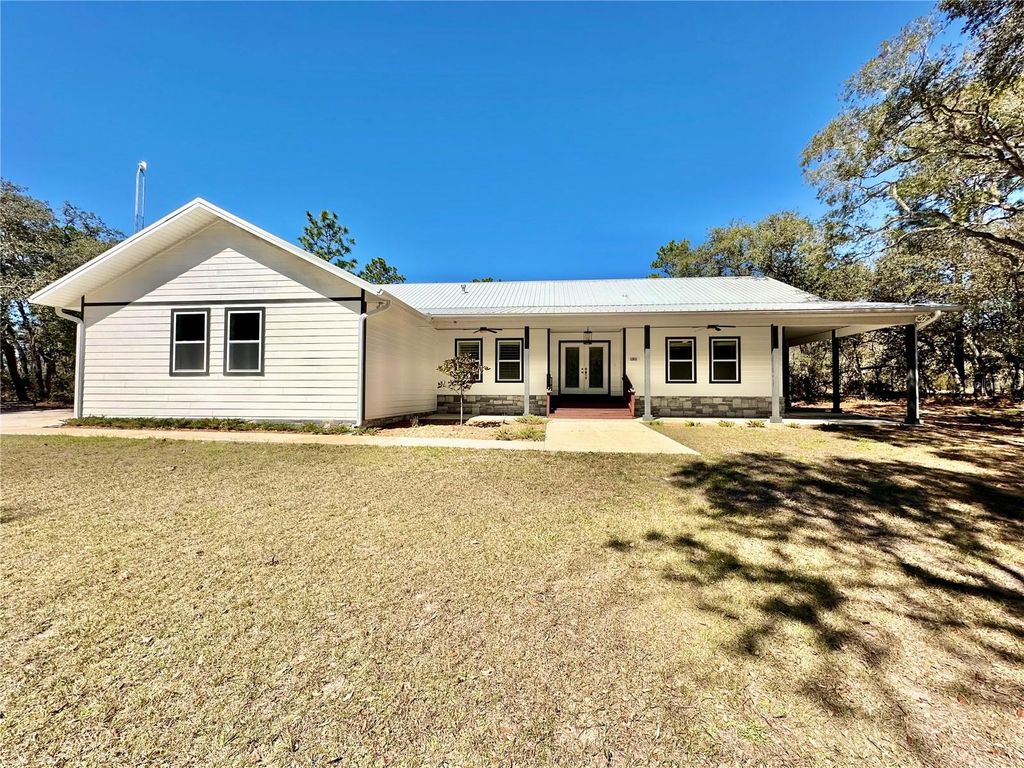 Photo of 12031 SE 66th Place, Morriston, FL 32668 (MLS # OM719463)