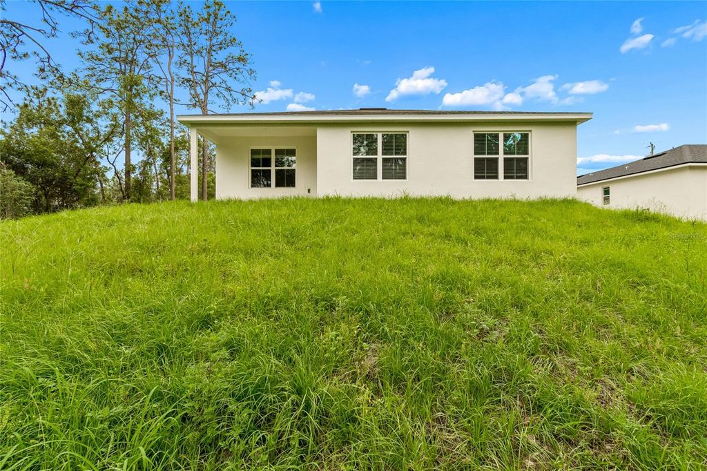Photo of 13314 SW 78 Circle #121, Ocala, FL 34473 (MLS # O6404648)