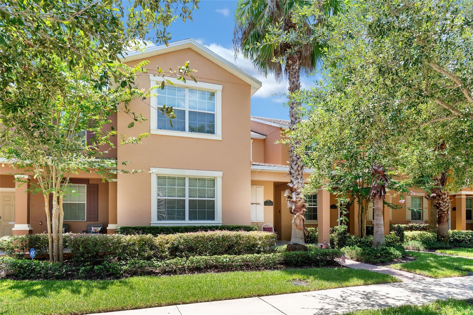 Welcome to this beautifully maintained townhome located in one of Winter Garden’s most desirable communities. Featuring 4 bedrooms, 2.5 bathrooms, and nearly 2,000 square feet of thoughtfully designed living space, this home delivers the comfort of a single-family residence with the convenience of low-maintenance living.
The main floor offers a bright open layout with elegant tile flooring, a modern kitchen featuring granite countertops and 42" upper cabinets, and a spacious primary suite complete with a walk-in closet and private bathroom. Upstairs, you'll find three additional bedrooms and a flexible loft—perfect for a home office, media room, or play area.
Step outside to a covered brick-paver patio and enjoy the expansive green lawn located just behind the home, creating the perfect space for outdoor fun, gatherings, or for kids to safely play. A private breezeway connects the home to a detached 2-car garage.
The property is located near beautiful lakes and scenic walking areas, adding to the charm of this vibrant community. Residents also enjoy access to exceptional amenities, including resort-style pools, a clubhouse, fitness center, tennis and basketball courts, playgrounds, walking and biking trails, and a private boat ramp.
Zoned for top-rated A-rated public schools, this home is just minutes from Hamlin Town Center, with Publix, Walmart, dining options, the new public library, and a picturesque lakefront park all close by. With its unbeatable location, family-friendly setting, and outstanding lifestyle offerings, this is a place you’ll be proud to call home.
