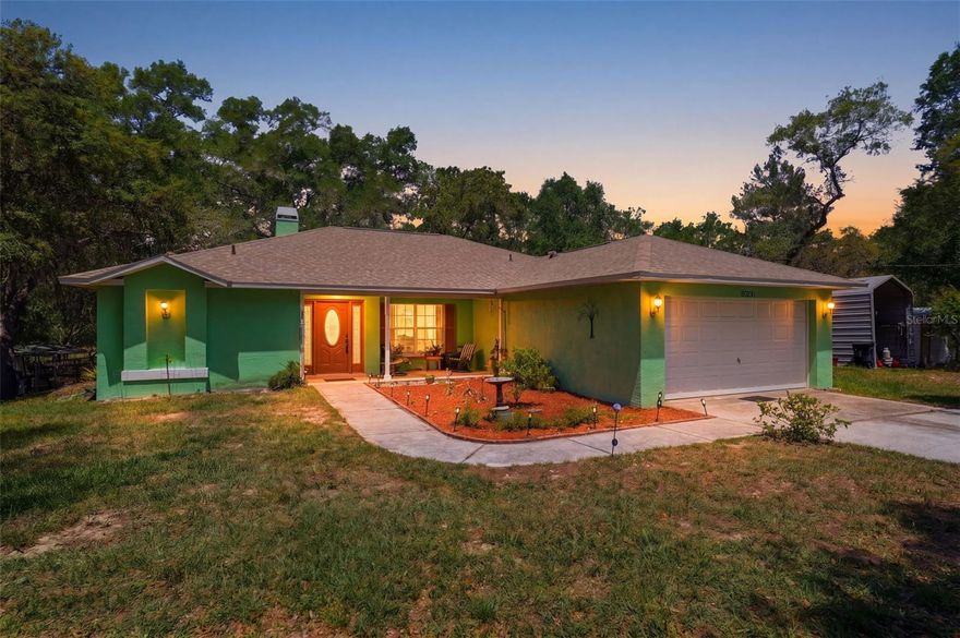 Tucked away on a beautifully wooded 3.8-acre parcel with agricultural zoning, this property offers the kind of space, privacy, and freedom that’s getting harder to find. Surrounded by mature trees and set on expansive land, this is where you can finally spread out, bring your toys, and enjoy true Florida living without feeling boxed in.

Inside, the home offers a comfortable and functional layout designed for everyday living. Natural light fills the main living spaces, creating a warm and inviting atmosphere, while the kitchen serves as the heart of the home with plenty of room to gather and entertain. The bedrooms are well-sized, and the overall layout provides a great balance of openness and privacy, making it ideal for both quiet nights in and hosting family and friends.

The land is fully usable with a mix of open clearings and shaded areas, giving you the flexibility for animals, equipment, gardening, or simply enjoying your own private retreat. A gated entrance, perimeter fencing and cross fencing add function and peace of mind. In addition to the attached 2-car garage, the property features a detached 2-car garage with a dedicated workshop complete with A/C—perfect for projects, storage, or a comfortable workspace year-round. There is also a separate shed with a garage door and electric already in place, adding even more versatility.

The home is positioned perfectly on the lot, giving you privacy from the road while still offering easy access in and out. Whether you’re looking for a homestead, a place to park your equipment, or just room to breathe, this property delivers.

Located just a short drive from shopping, dining, and major roadways, you get the best of both worlds—quiet country feel with everyday conveniences still within reach.