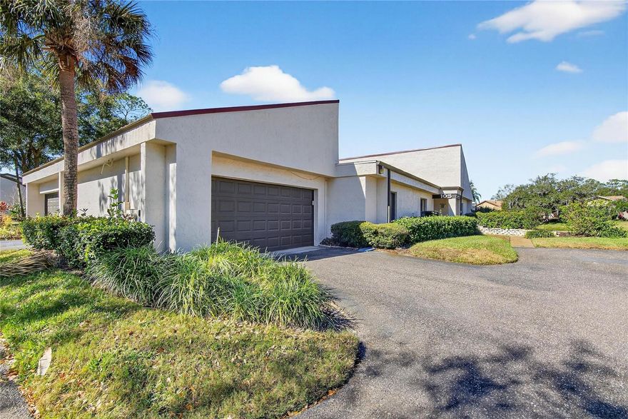 Walden Lake Fairway Villas. Beautiful 2-bedroom, 2-bath villa with a dedicated office or 3rd bedroom, offered furnished, and a 2-car garage overlooking a peaceful pond. The nicely remodeled kitchen features modern finishes and opens to the living and dining areas, creating a bright and comfortable space. Tile flooring throughout adds durability and easy maintenance. Enjoy added peace of mind with a 2024 metal roof and the reassurance that the property has experienced no flooding during hurricanes. Located in a quiet, well-maintained neighborhood with the community pool just a short walk away, this home is ideal for relaxed, low-maintenance living. A wonderful opportunity for full-time residents or seasonal owners seeking comfort, convenience, and tranquility. Call today for your personal tour.